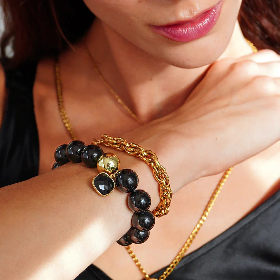 Onyx Bundle Armband Set mit tiefschwarzen Onyxkugeln und 18K vergoldetem Edelstahl, elegantes Schmuckdesign