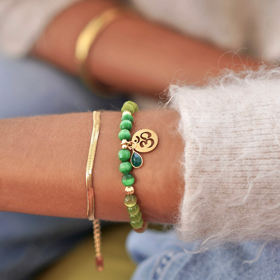 'Green Essence Om' Armband aus Katzenauge-Quarz