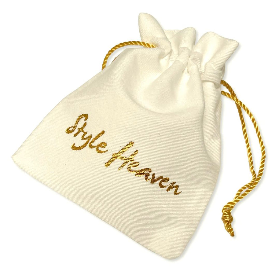Beutel aus Stoff mit goldenem Zugband und Aufschrift Style Heaven zur Aufbewahrung eines Cord Armbands