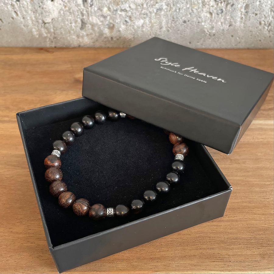 Armband aus Holz mit gravierten versilberten Perlen